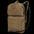 The Condor Hydration Carrier 2 is a tan tactical backpack featuring two zippered compartments, MOLLE webbing, and a drinking hose.